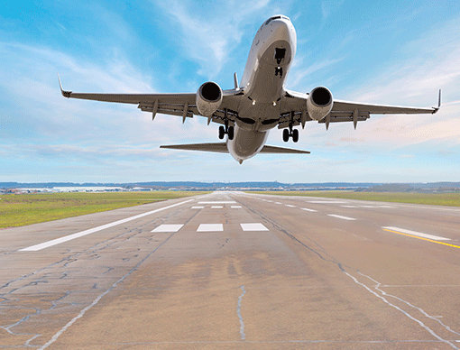 airplane taking off from runway