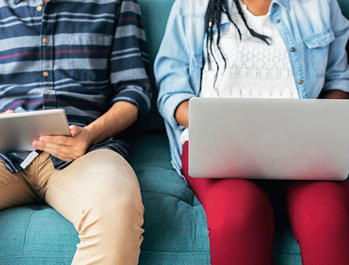 male and female on laptops male and female on laptops