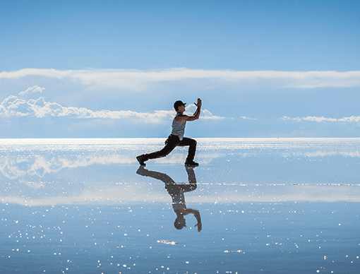 person-stretching on-beach person-stretching on-beach