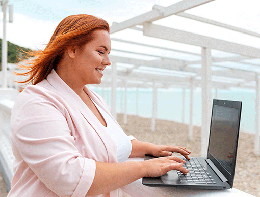 woman typing on computer woman typing on computer