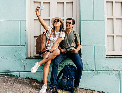 Female and male taking photo Female and male taking photo