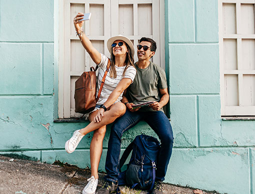 Female and male taking photo